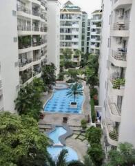 View of residential buildings with swimming pools