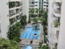 View of residential buildings with swimming pools