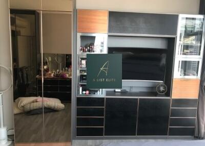 Bedroom with wardrobe and media unit