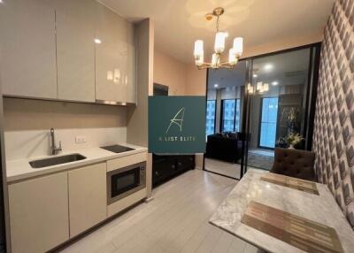 Modern kitchen with dining area and sliding glass doors