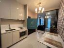 Modern kitchen with dining area and sliding glass doors