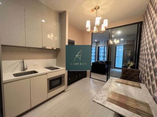 Modern kitchen with dining area and sliding glass doors