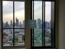 View of cityscape from tall building with multiple windows