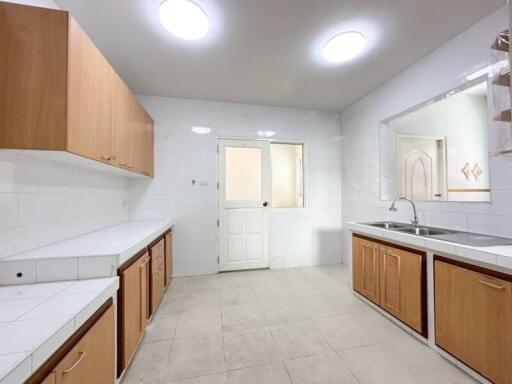 Spacious kitchen with ample countertop and storage space