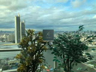 view from living room window overlooking city skyline