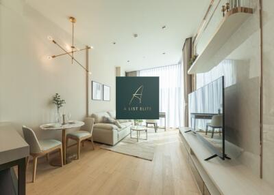 Modern living room with dining area and large TV