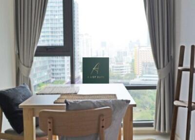 Well-lit dining area with view of the city