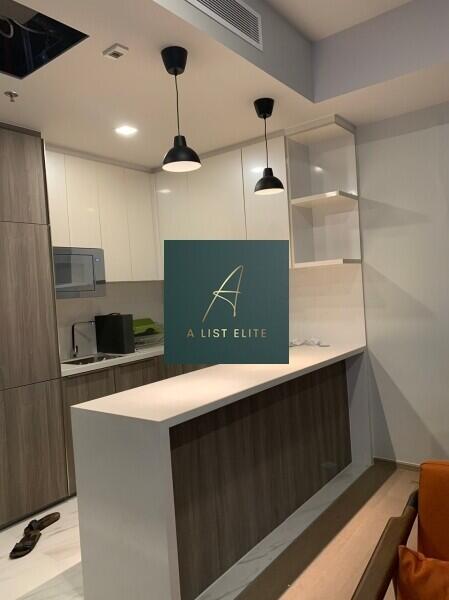 Modern kitchen with wooden cabinets and a breakfast bar