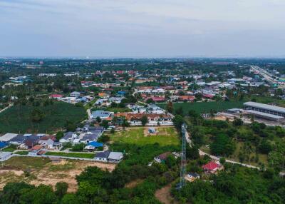 Aerial view of the property neighborhood