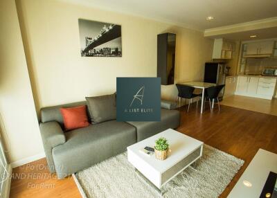 Modern living room with open kitchen