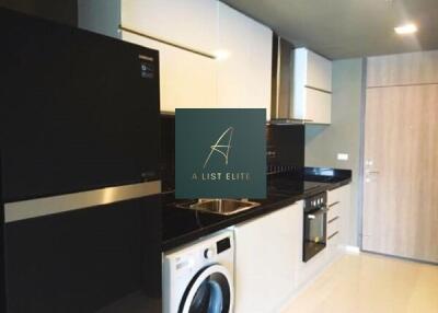 Modern kitchen with appliances and cabinetry