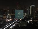 Night view of city skyline with buildings and infrastructure