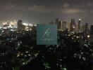 Cityscape view at night with illuminated buildings