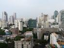 view of city skyline with multiple buildings and skyscrapers