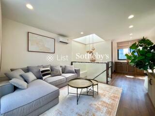 Modern living room with L-shaped sofa and coffee table