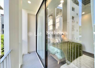 Bedroom with attached balcony