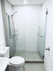 Modern bathroom with glass shower enclosure