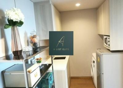 Modern laundry area with cabinet space