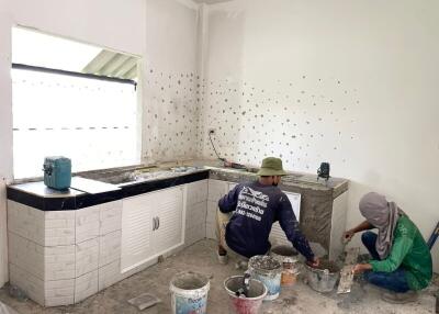 Photo of an unfinished kitchen under renovation