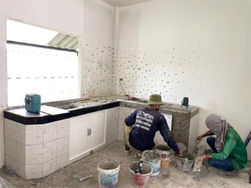 Photo of an unfinished kitchen under renovation