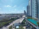 City view with high-rise buildings and pool