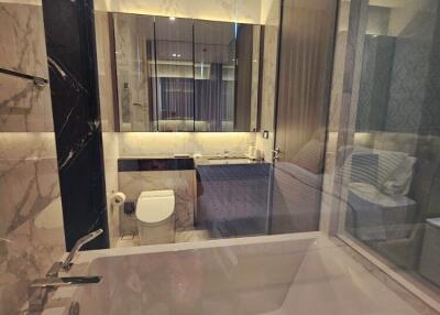 Modern bathroom with bathtub and toilet