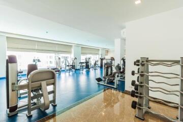 Spacious and well-equipped fitness center with various exercise machines