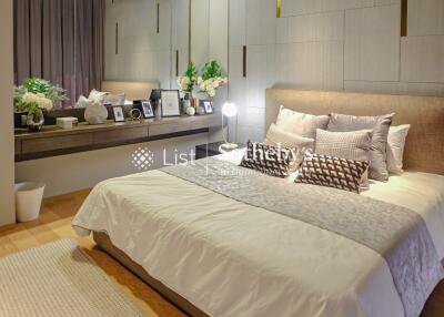 Cozy bedroom with modern decor and ample lighting