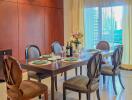 Elegant dining area with a well-set table and natural light