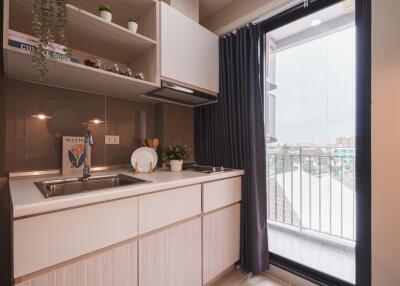 Modern kitchen with balcony access