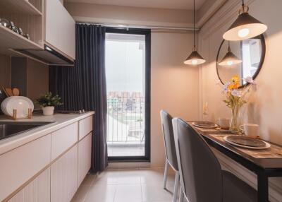 Modern kitchen with dining area and large window