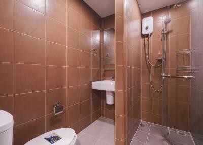 Modern bathroom with shower and fixtures