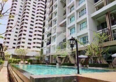 High-rise apartment buildings with a swimming pool