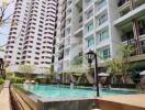 High-rise apartment buildings with a swimming pool