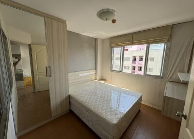 Bedroom with bed and closet