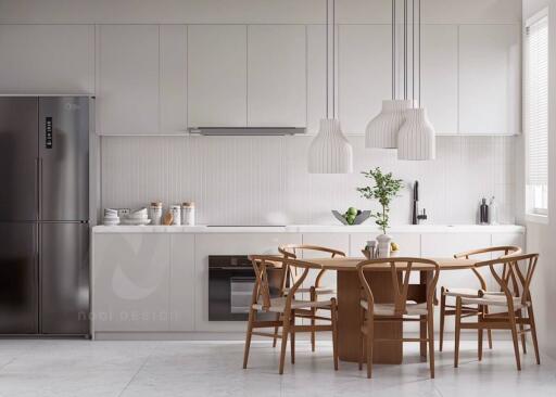 Modern kitchen with white cabinets, stainless steel fridge, wooden dining table and chairs, and pendant lighting