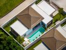 Aerial view of a modern house with a pool