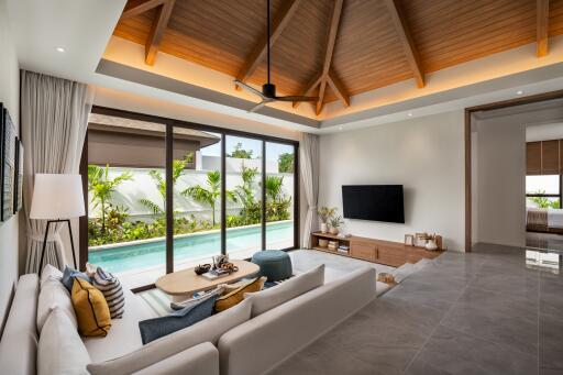 Spacious living room with pool view