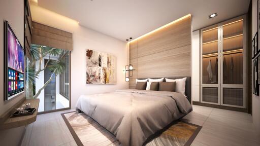 Modern bedroom with a large bed, natural light, and built-in wardrobes