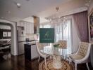 Elegant dining area with glass table and chandelier