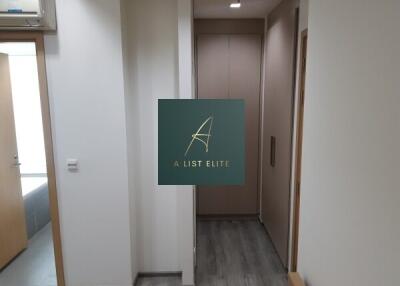 Modern hallway with wooden flooring and built-in storage