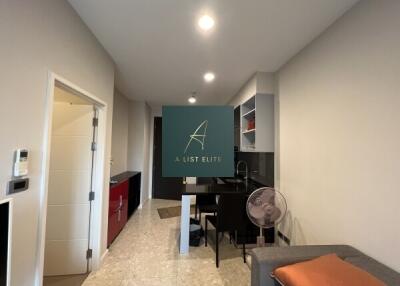 Modern kitchen and dining area with hallway view