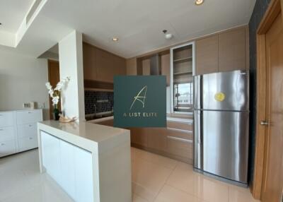 Modern kitchen space with sleek cabinetry and stainless steel appliances