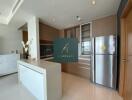 Modern kitchen space with sleek cabinetry and stainless steel appliances