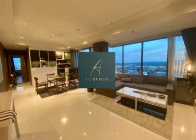 Spacious living room with a city view