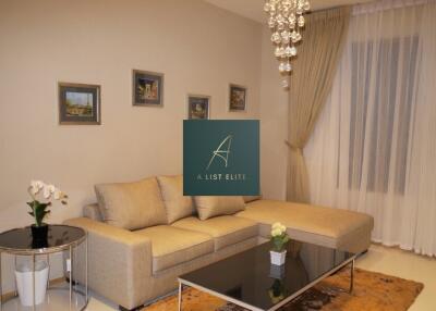 Modern living room with sofa and chandelier