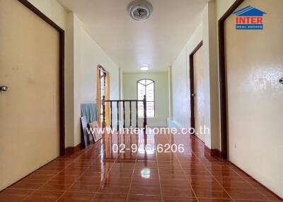 Second-floor hallway with multiple doors