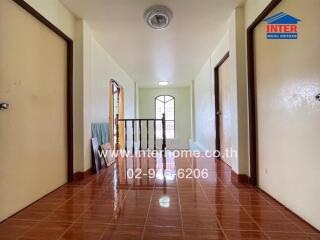 Second-floor hallway with multiple doors