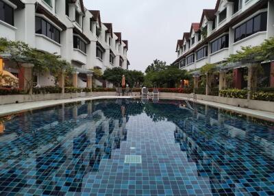 Apartment complex with a swimming pool