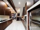 Spacious modern kitchen with ample storage and stainless steel appliances